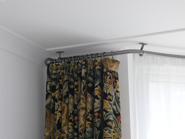 Bradleys 25mm ceiling fix bay window curtain pole and Morris & Co Forest velvet curtains ...